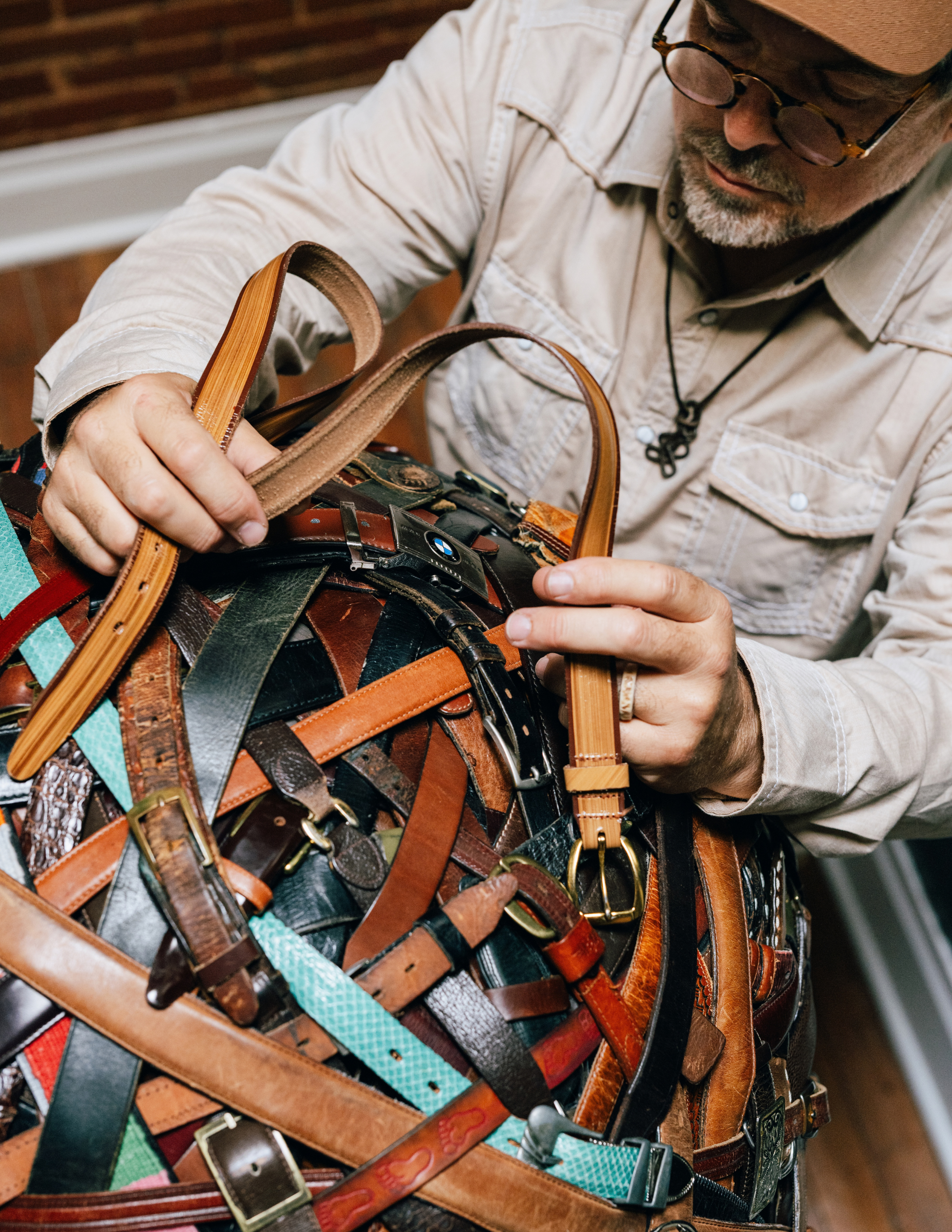 Close up of Kreg Harrison creating his belt sculpture Humanity