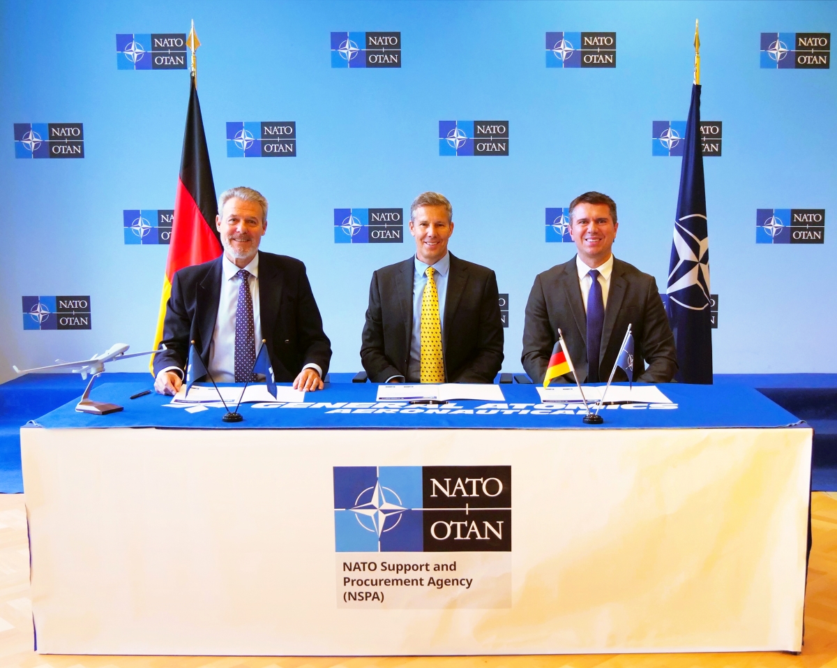 GA-ASI and NSPA signed a contract to purchase eight MQ-9B SeaGuardians for Germany on January 12. From left to right: Allan McLeod, NSPA, Chris Dusseault, GA-ASI, and Joseph Lyden, NSPA.