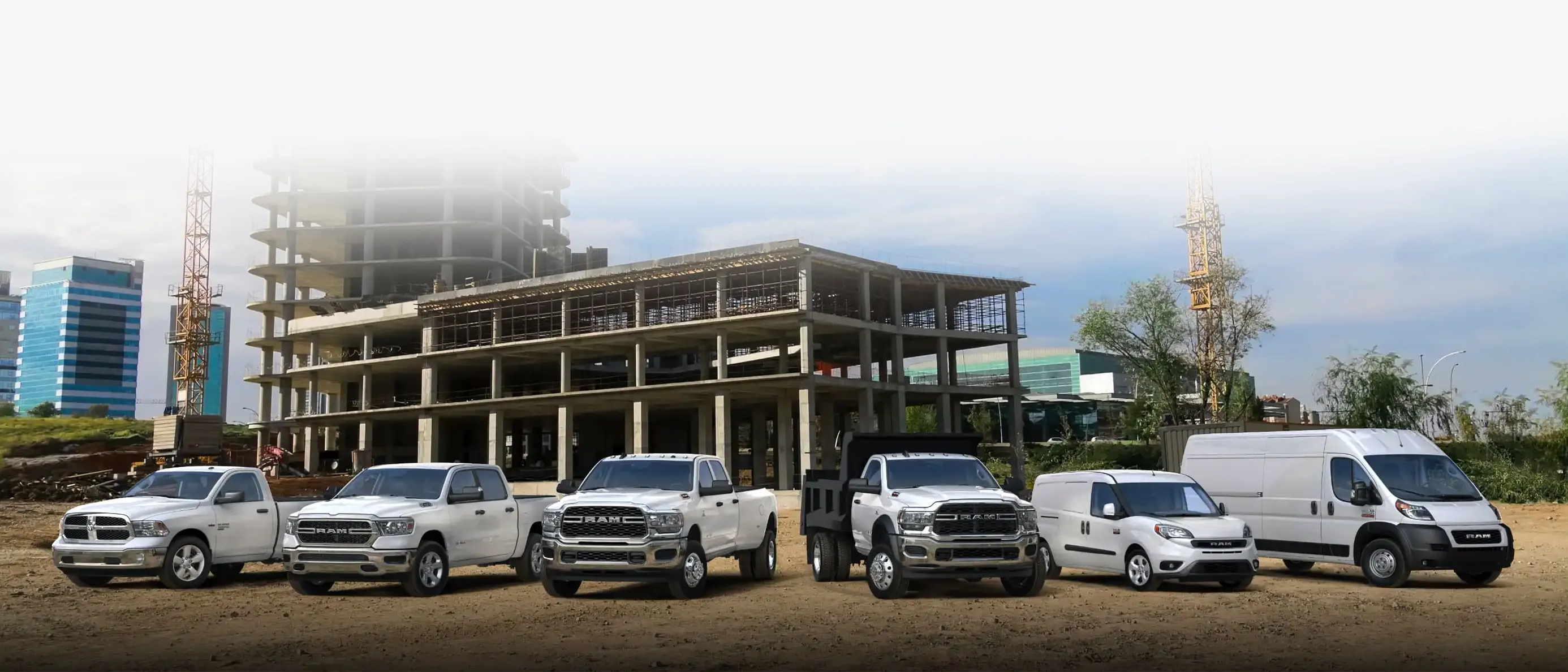 A photograph of a lineup of Ram Commercial trucks