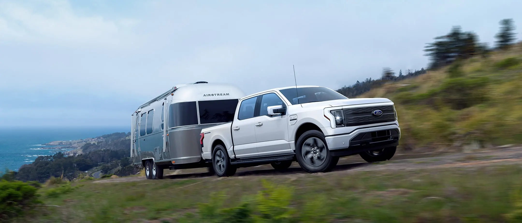 The Ford F-150 Lightning towing a camper