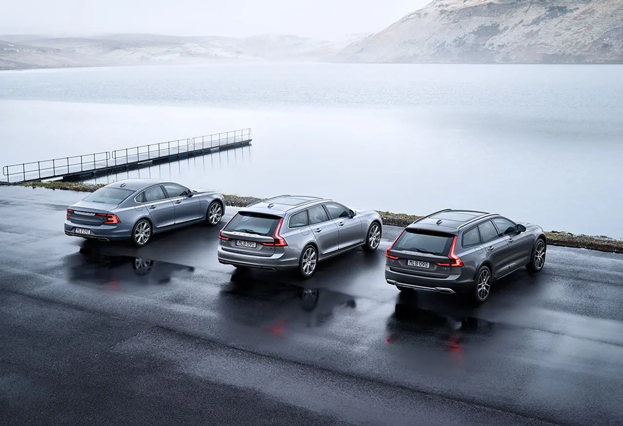 Polestar family parked in front of a lake