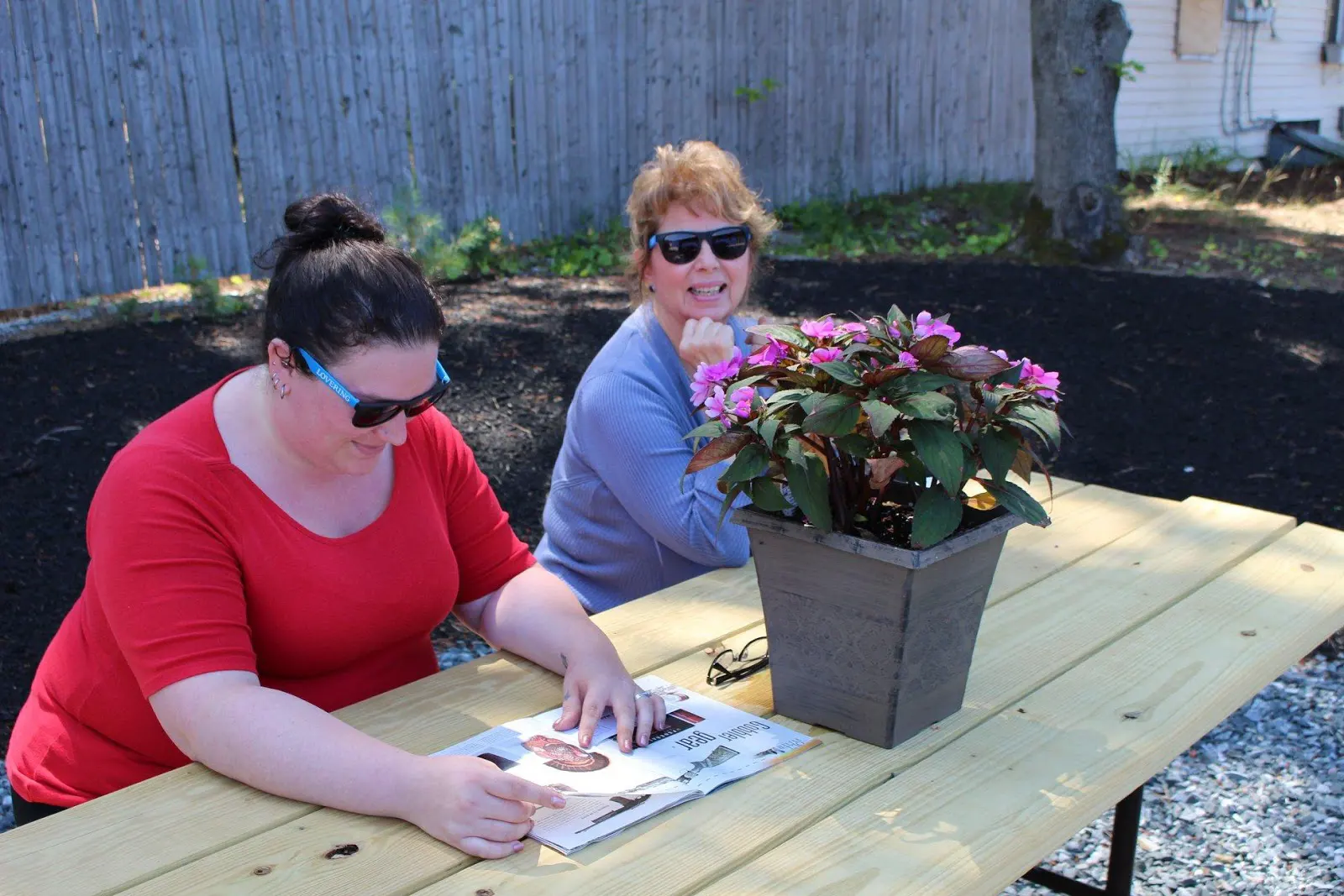 Women volunteering at the Mitsubishi Table