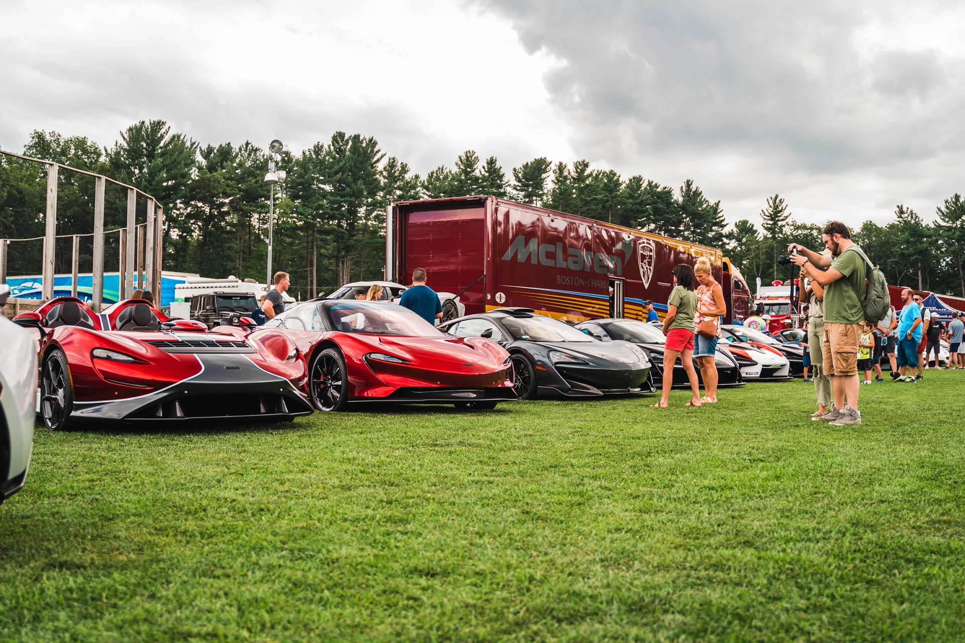 McLaren Boston Dream Ride Experience Lineup of McLaren's with people taking pictures