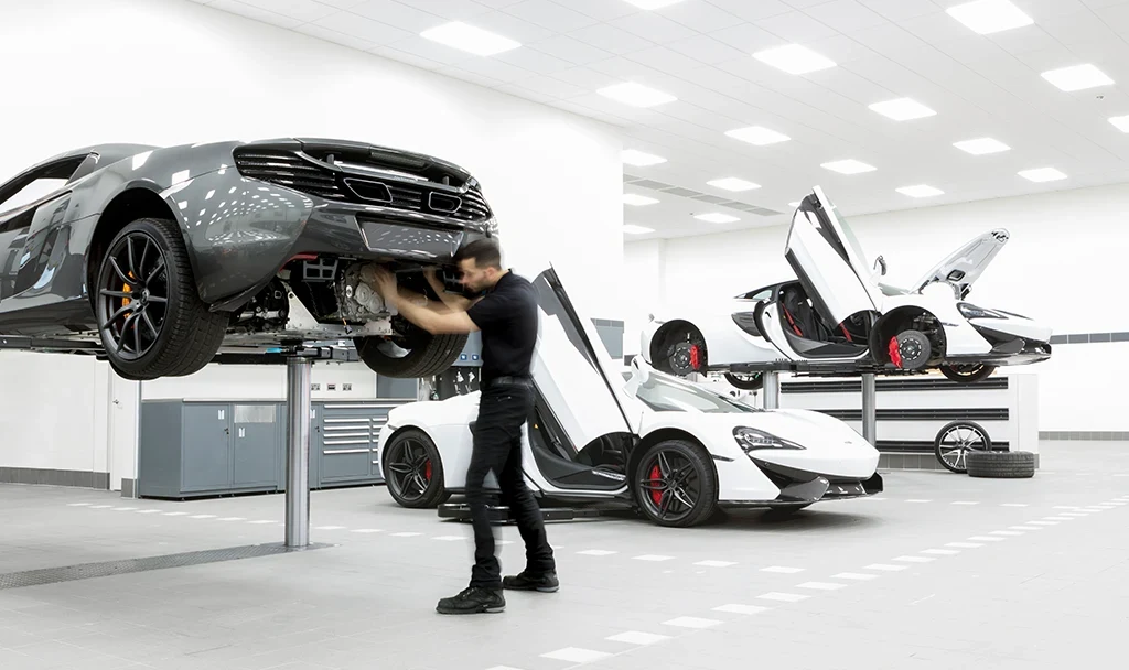 Photo of a McLaren being serviced.