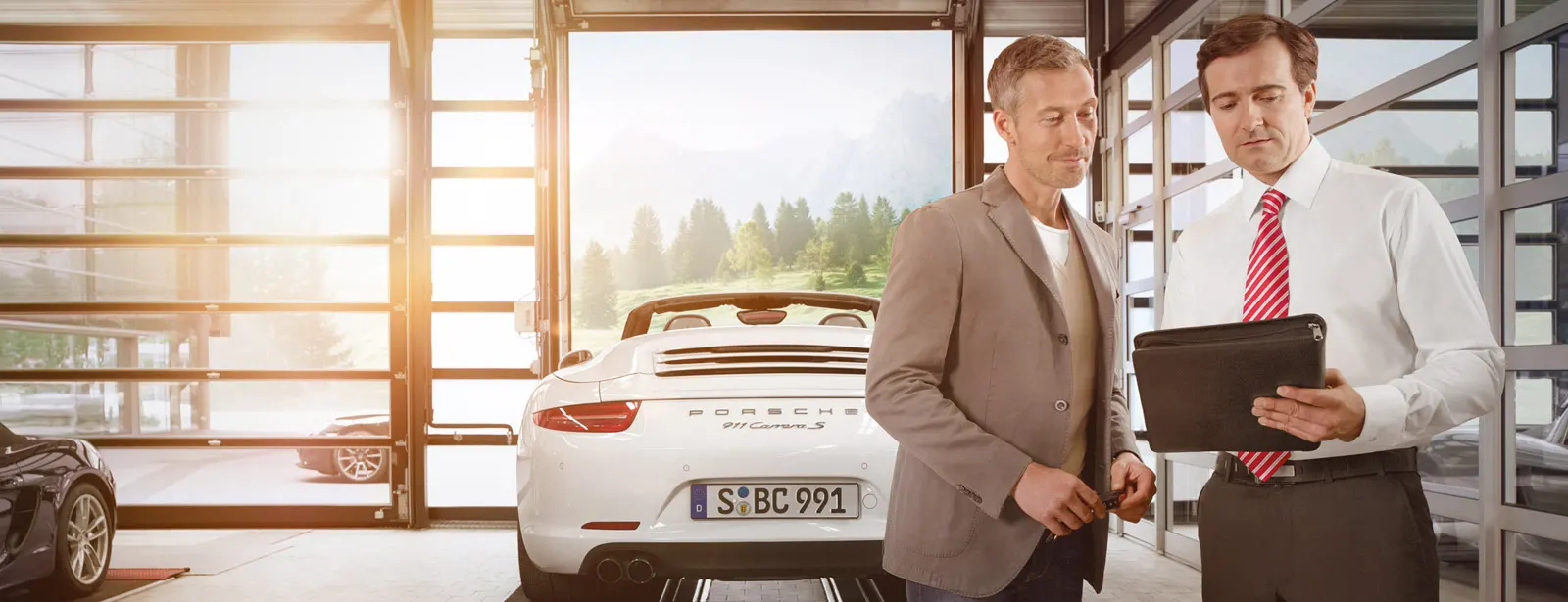 Porsche Sales Man with Owner