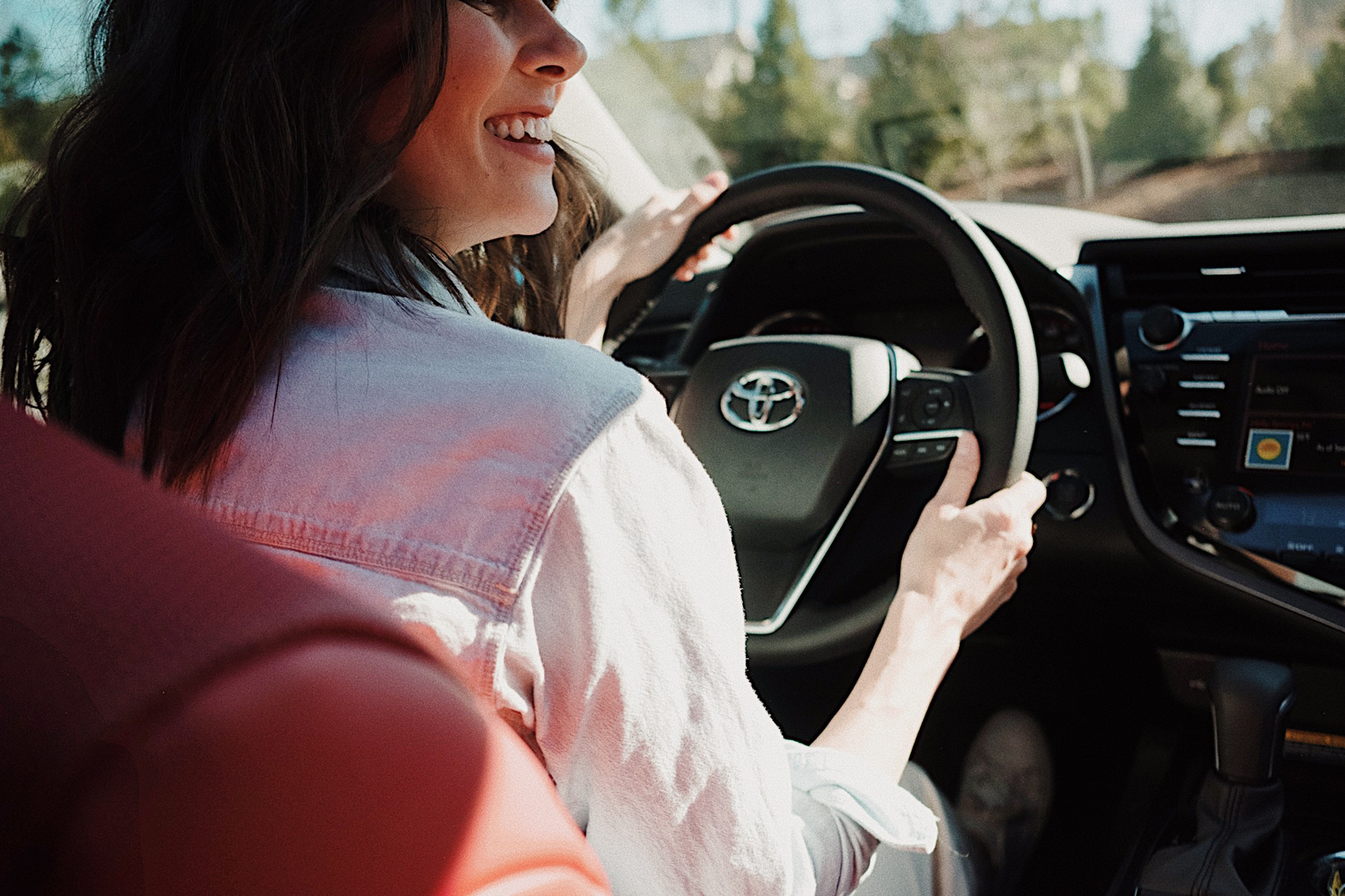 Happy female Toyota driver