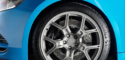 a blue Volvo car's tire