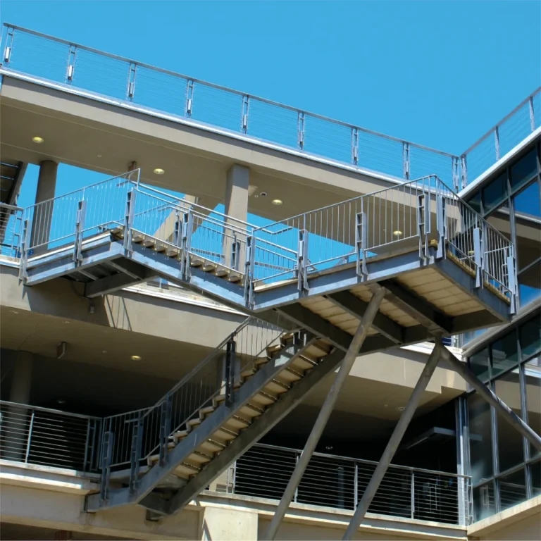 Structural engineer reviewing steel beam installation on-site