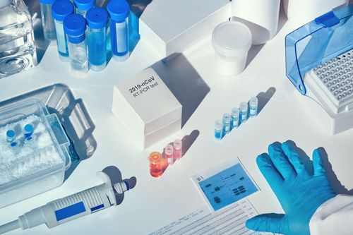 Laboratory setup with PCR testing equipment and samples