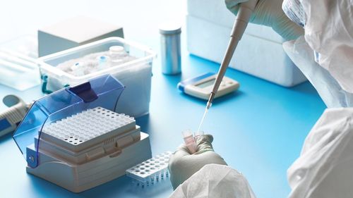Medical professional conducting a rapid test in a laboratory setting