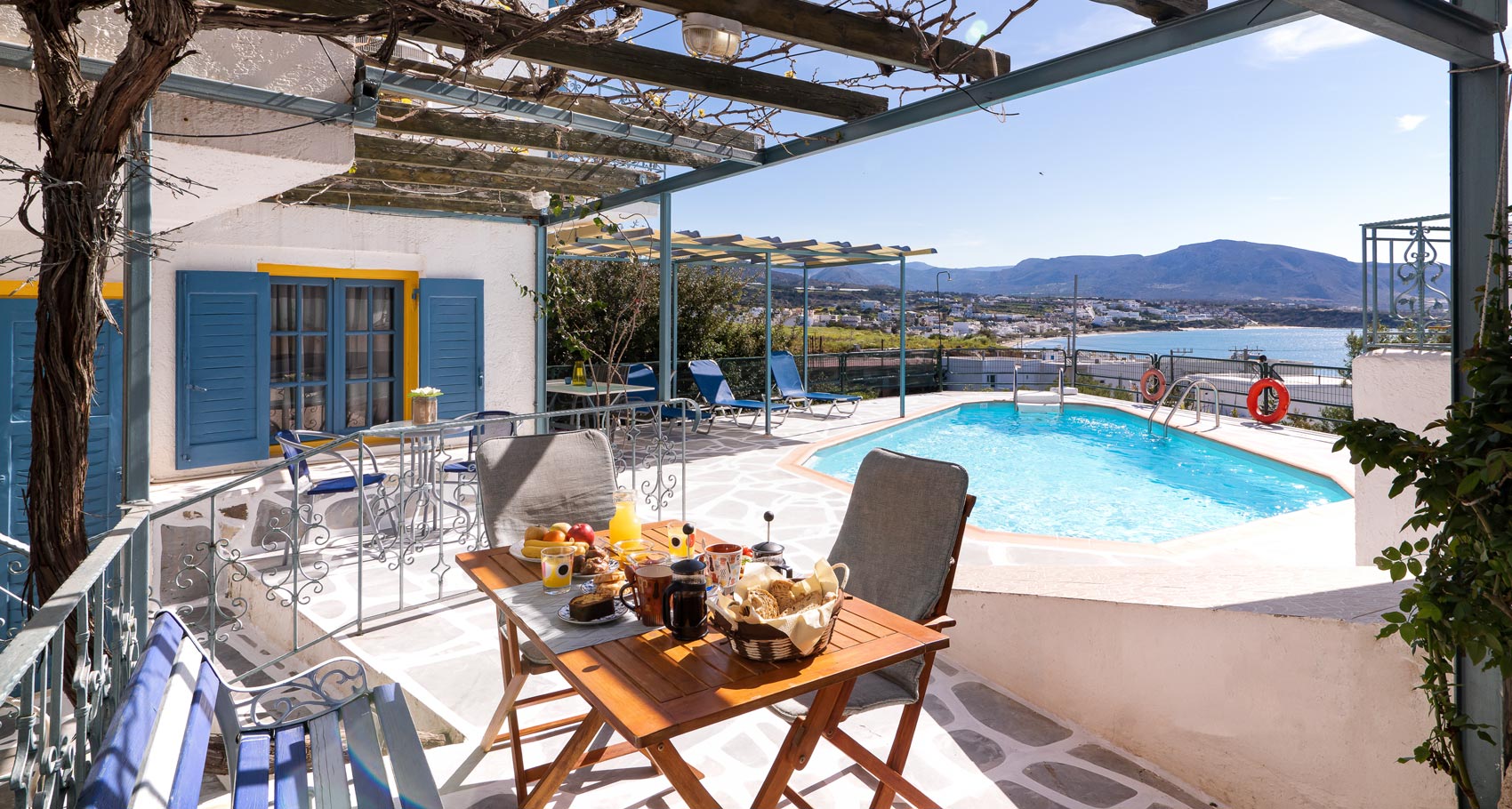 Breakfast at the pool area, Afroditi Apartments