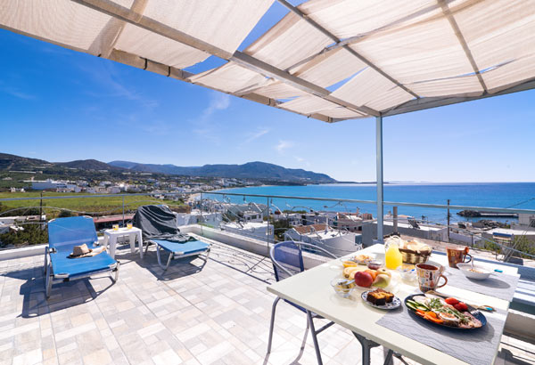 Afroditi Apartments, Breakfast table with sea view