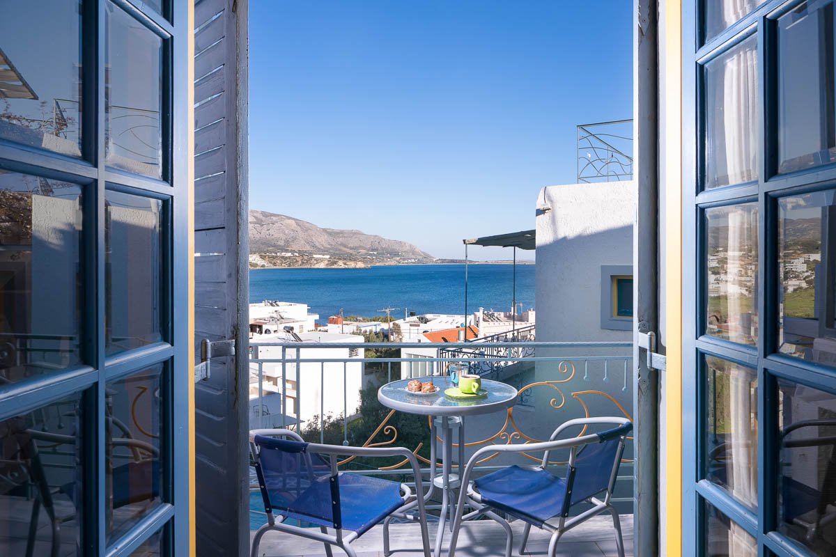 Afroditi Apartments, Breakfast table with sea view