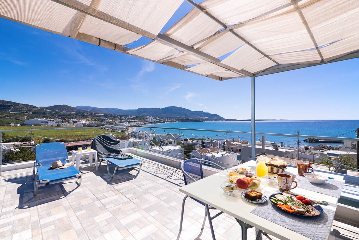 Afroditi Apartments, Breakfast table with sea view