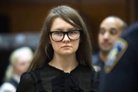 FILE - Anna Sorokin, who claimed to be a German heiress, returns to the courtroom during her trial on grand larceny and theft of services charges, April 25, 2019, in New York. (AP Photo/Mary Altaffer, File)