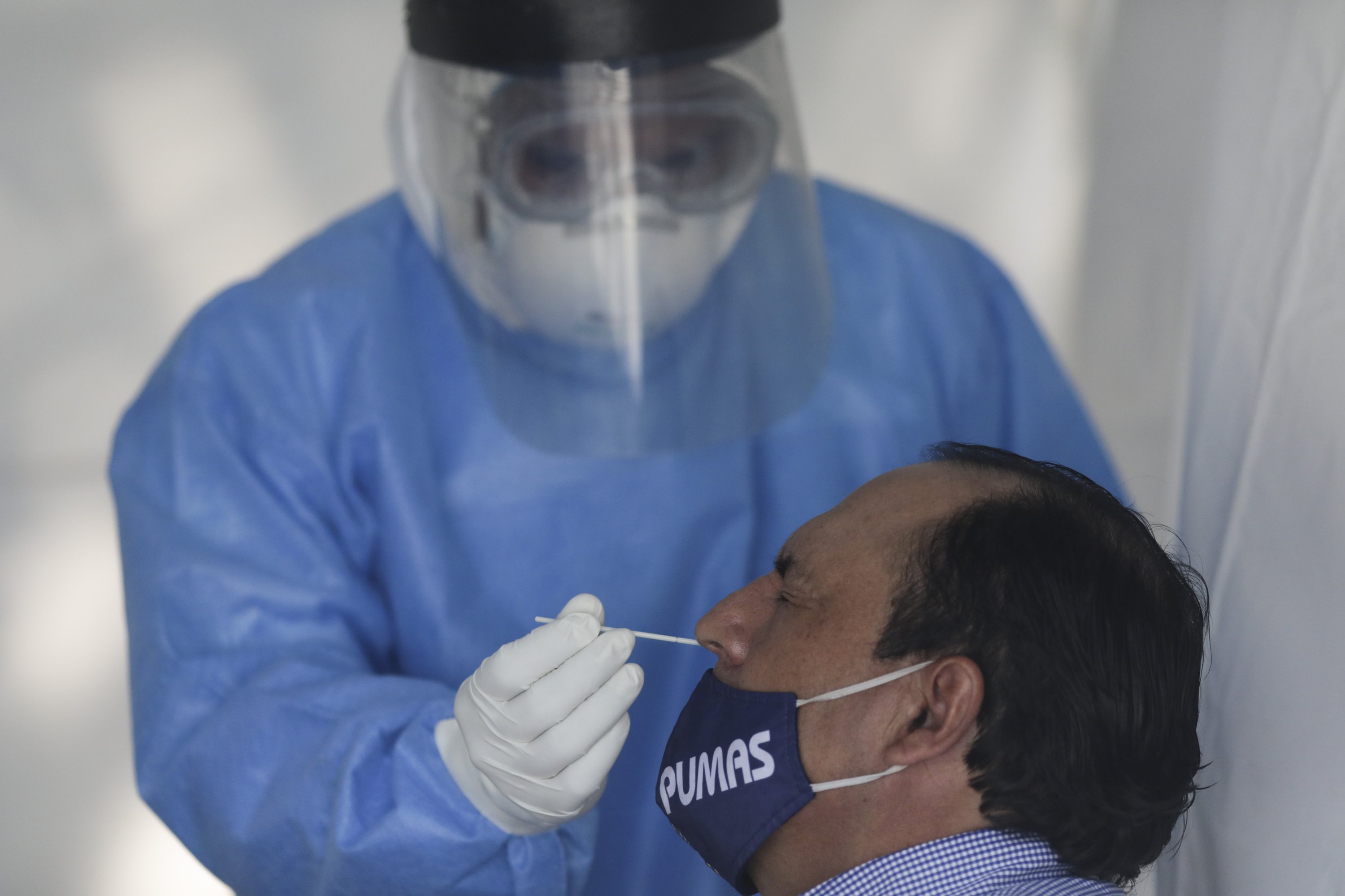 Mexico City closes bars, limits eateries as virus cases rise AP News