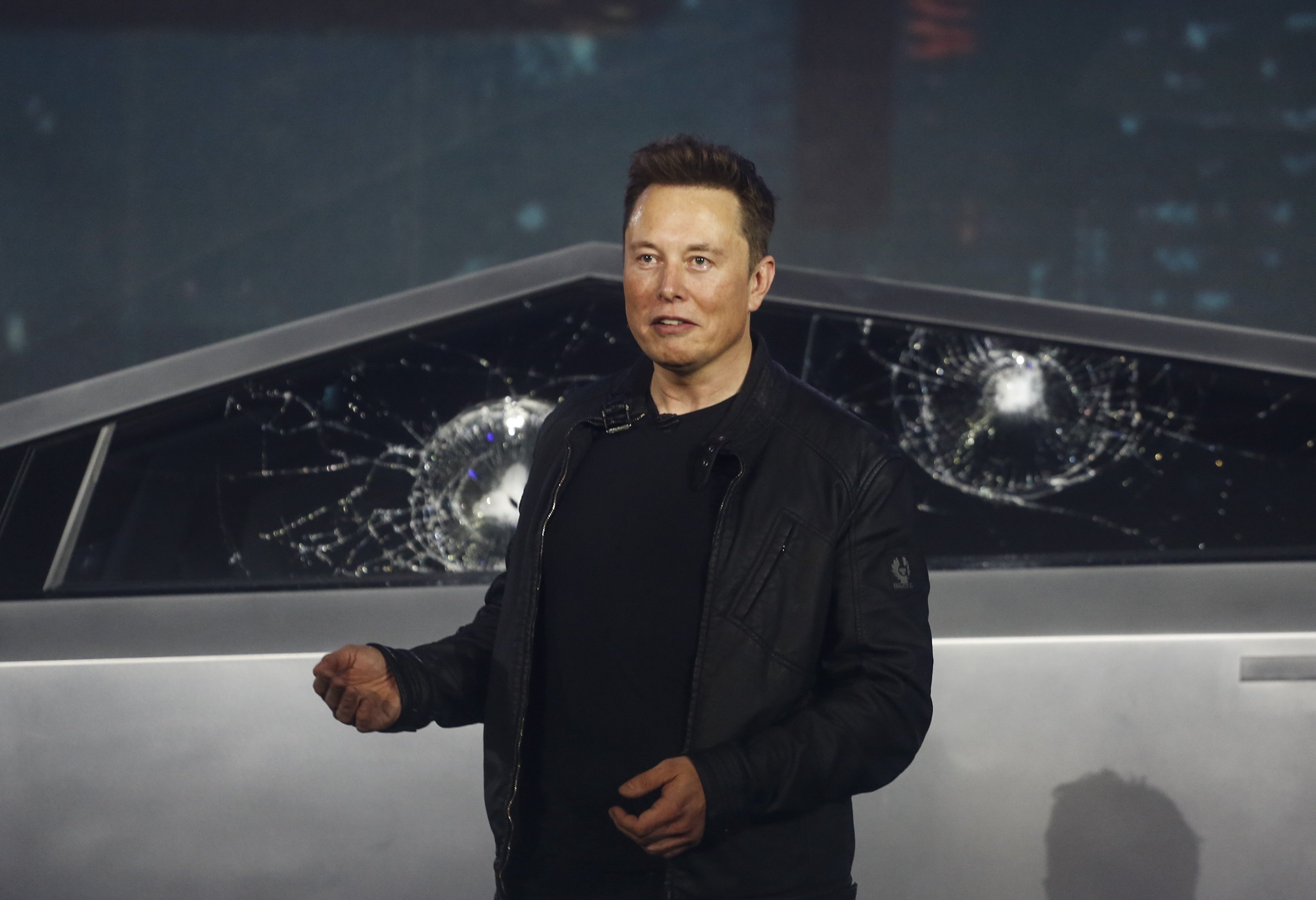 Stainless Steel Broken Glass And Buzz Tesla Makes A Pickup