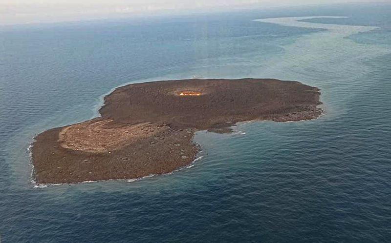 This photo released by Azerbaijani Ministry of Emergency Situations on Monday July 5, 2021 shows an aerial view of the aftermath of a strong explosion in the Caspian Sea area, about 10 kilometers (6 miles) from the Umid gas field, which is 75 kilometers (45 miles) off the coast of the capital, Baku. A strong explosion has shaken the Caspian Sea area where Azerbaijan has extensive offshore oil and gas fields and a column of fire rose late Sunday, but the state oil company says none of its platforms were damaged. The cause of the blast is not immediately determined, but state oil company SOCAR says preliminary information indicates it was a mud volcano. (Azerbaijani Ministry of Emergency Situations via AP)