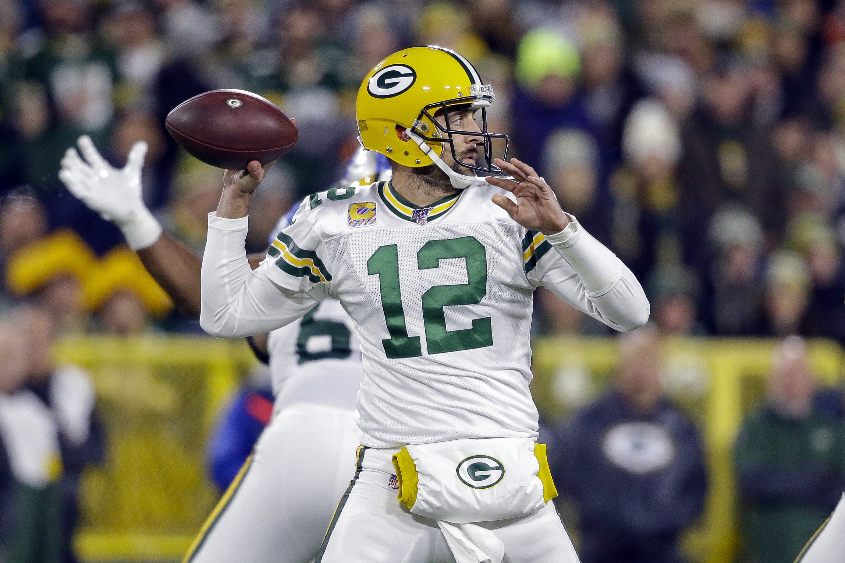 Packers get the calls, Crosby hits late FG to beat Lions.