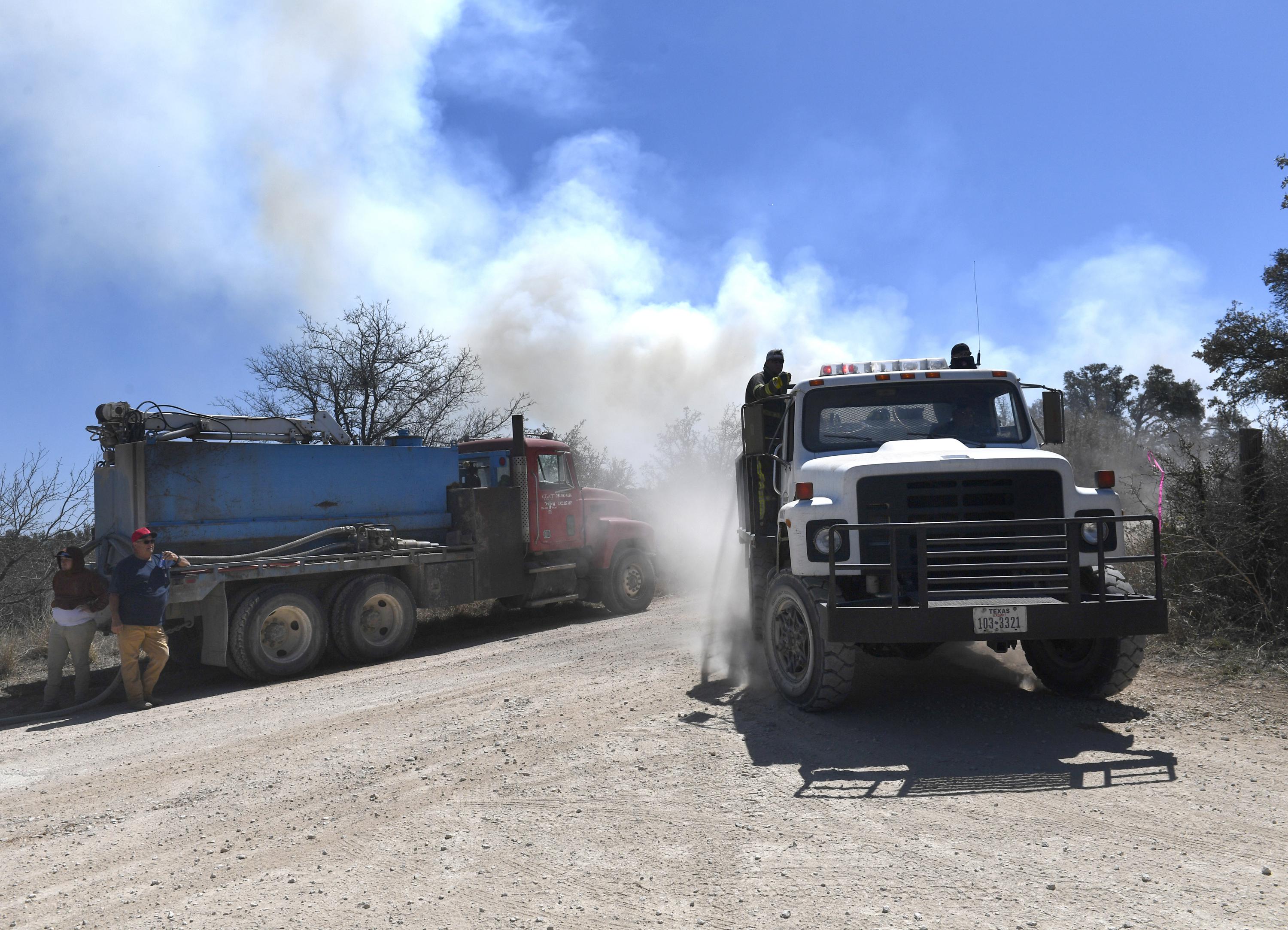 Rain finally in forecast for Texas areas scorched by fires AP News