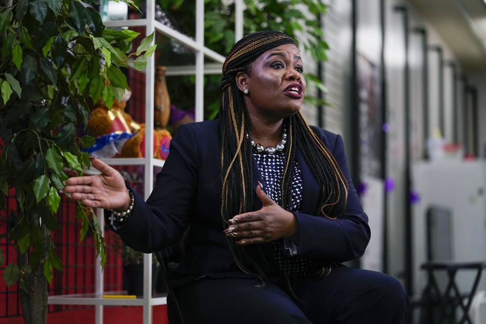 FILE - Rep. Cori Bush, D-Mo., speaks during an interview Nov. 12, 2021, in Northwoods, Mo. Bush is no stranger to protests. She spent years marching the streets of St. Louis and Ferguson, Mo., rising to public office on the strength of her activism. But as she looked out the window of the Capitol on Jan. 6, 2021, only her third day as a member of Congress, she knew what was about to take place would be no peaceful protest. The Confederate flags in the crowd, and the makeshift noose and gallows erected on the Capitol grounds, spoke to a more sinister reality. (AP Photo/Jeff Roberson, File)