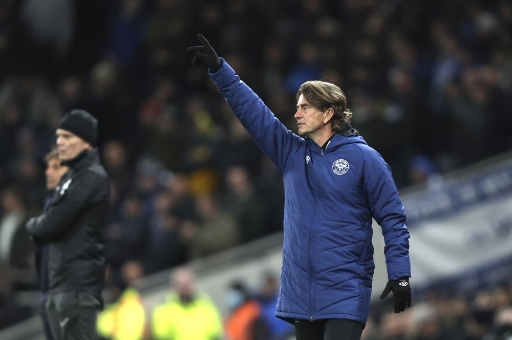 Brentford's head coach Thomas Frank gives instructions from the side line during the English Premier League soccer match between Tottenham Hotspur and Brentford at Tottenham Hotspur Stadium in London, England, Thursday, Dec. 2, 2021. (AP Photo/Ian Walton)