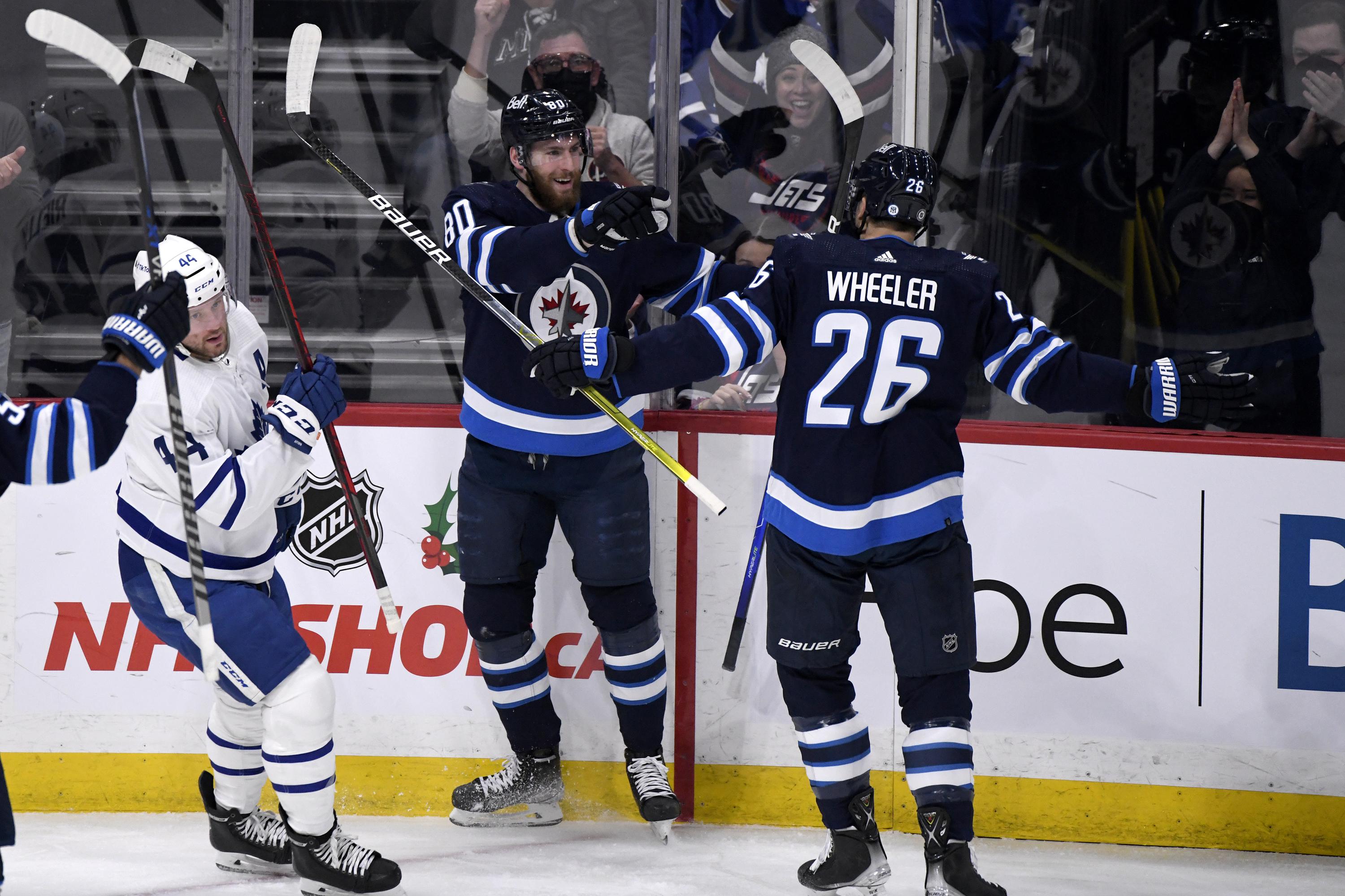 Wheeler plays 1,000th NHL game, Jets top Maple Leafs 6-3 | AP News