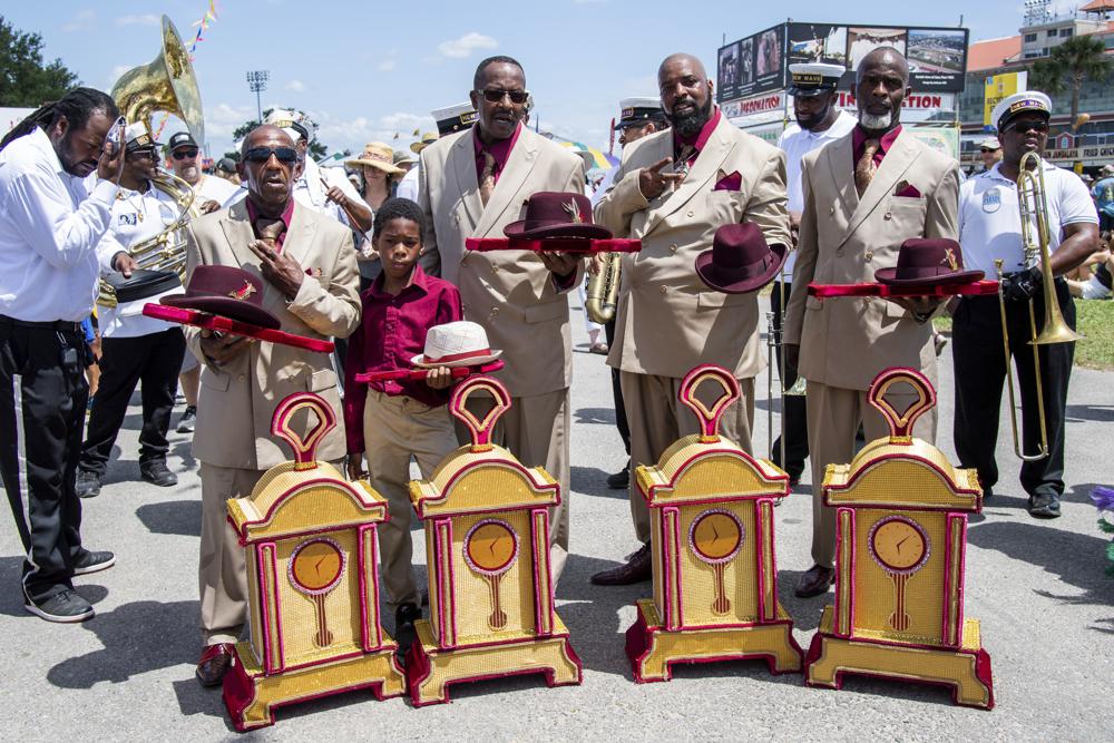 Members of the New Wave Brass Band with We Are One and Keep n it Real Social Aid & Pleasure Clubs perform a Jazz Funeral for George Wein at the New Orleans Jazz and Heritage Festival, on Friday, April 29, 2022, in New Orleans. (Photo by Amy Harris/Invision/AP)