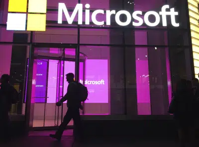 Microsoft reports outage for Teams, Outlook, other services | AP News