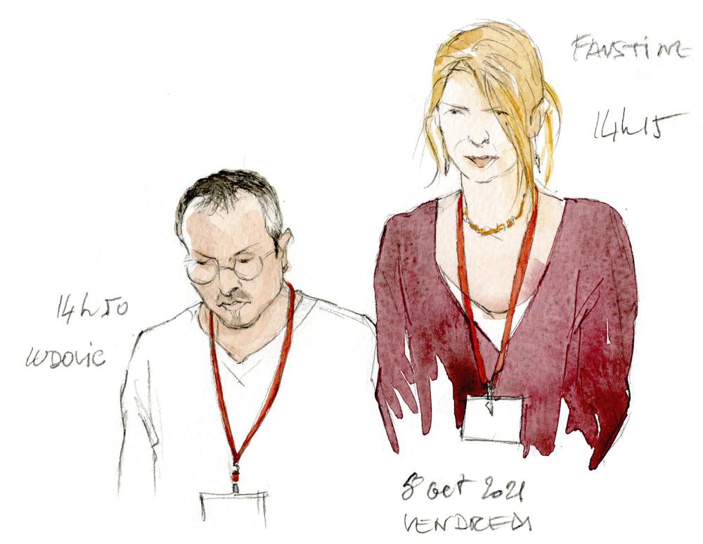 Ludovic, left, and Faustine testify Friday Oct. 8, 2021 during the Paris Attacks trial in Paris. For more than two weeks, dozens of survivors from the Bataclan concert hall in Paris have testified in a specially designed courtroom about the Islamic State’s attacks on Nov. 13, 2015 – the deadliest in modern France. The testimony marks the first time many survivors are describing – and learning – what exactly happened that night at the Bataclan, filling in the pieces of a puzzle that is taking shape as they speak.  (Noelle Herrenschmidt via AP)