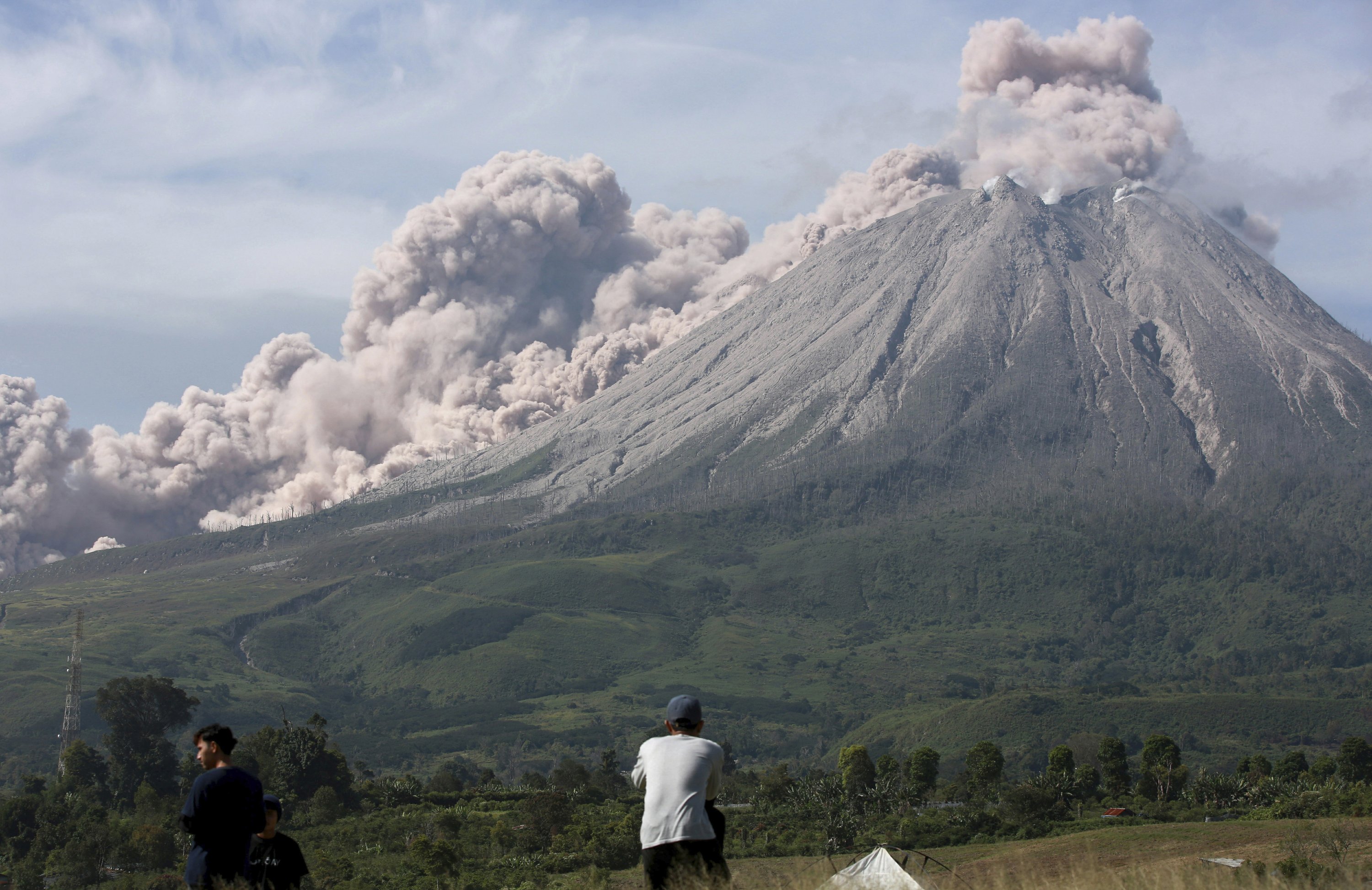 Indonesia’s Sinabung volcano releases new volley as hot