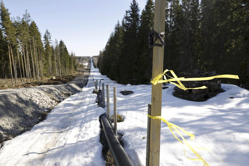 The construction site of the Finland-Russia eastern border barrier fence near Pelkola crossing point in Imatra, south-eastern Finland, Friday April 14, 2023. In Pelkola the construction of a pilot fence of approximately three kilometres has started on both sides of the Imatra border crossing point. Finland’s 1,340 kilometer (832 mile) border with Russia is the longest of any European Union member. (Roni Rekomaa/Lehtikuva via AP)