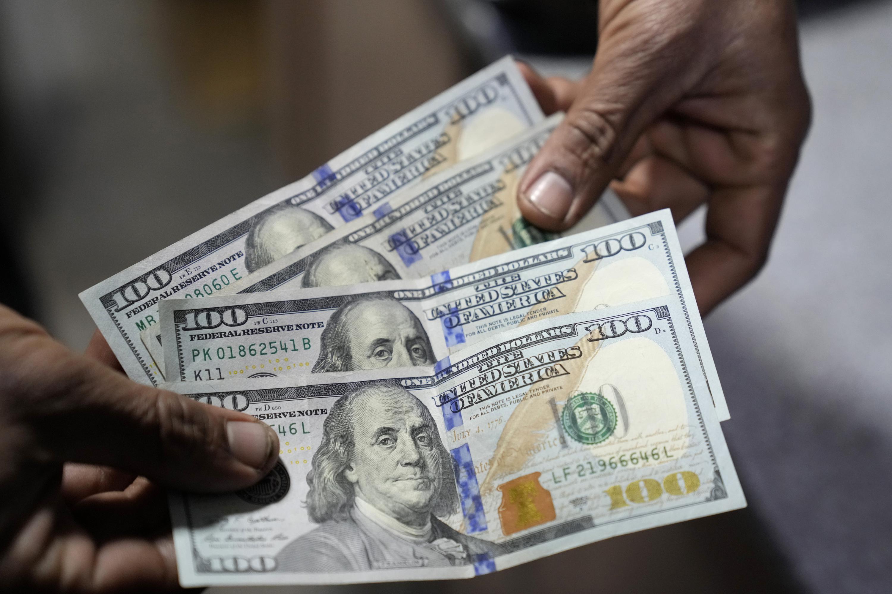 Cash strapped Pakistan s Rupee Plunges Amid Talks With IMF AP News