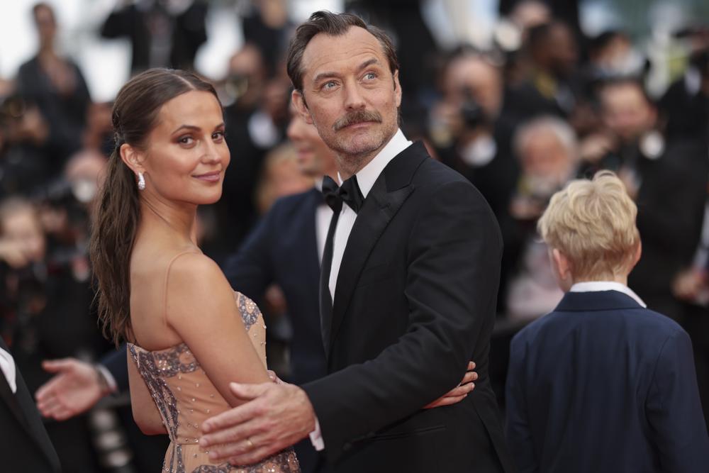 Alicia Vikander, left, and Jude Law pose for photographers upon arrival at the premiere of the film 'Firebrand' at the 76th international film festival, Cannes, southern France, Sunday, May 21, 2023. (Photo by Vianney Le Caer/Invision/AP)