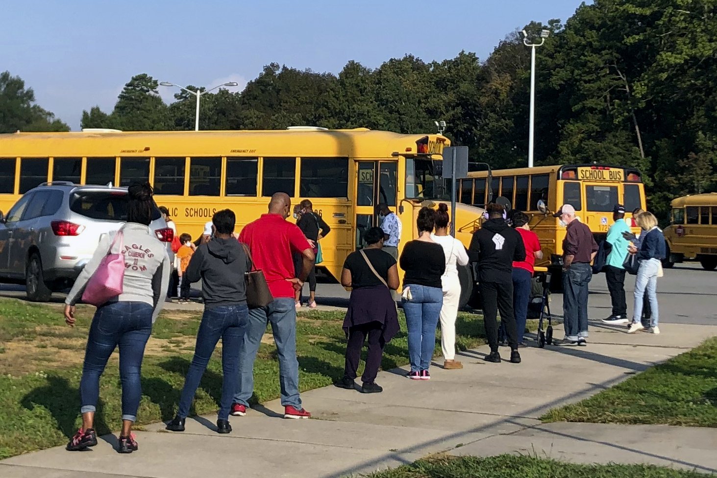 Life on the line: Early voters wait 'as long as it takes' 