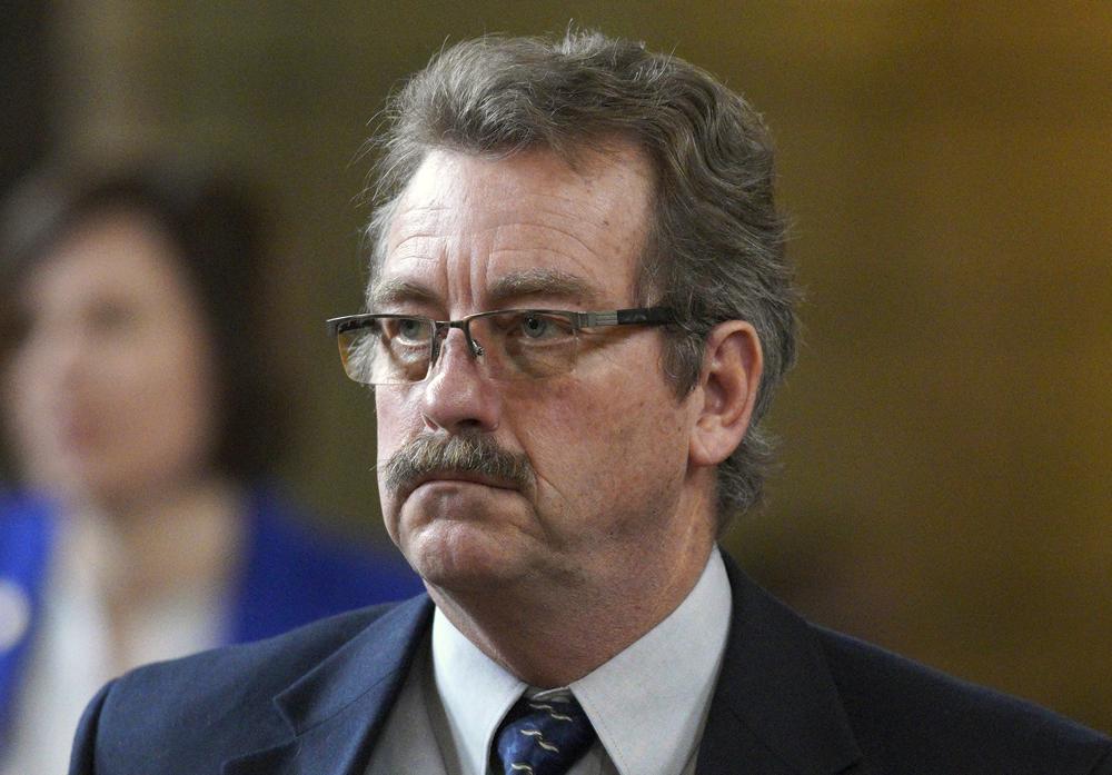 FILE - Nebraska state Sen. Bruce Bostelman, of Brainard, is seen in the Legislative Chamber in Lincoln, Neb., Friday, March 1, 2019. Bostelman has apologized after he publicly cited a persistent but debunked rumor alleging that schools are placing litter boxes in school bathrooms to accommodate children who self-identify as cats. (AP Photo/Nati Harnik, File)