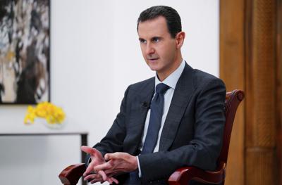 ARCHIVO - En esta fotografía facilitada el 9 de noviembre de 2019 por la agencia noticiosa oficial siria SANA, el presidente sirio Bashar Assad hace declarciones en Damasco, Siria.(SANA vía AP, Archivo)