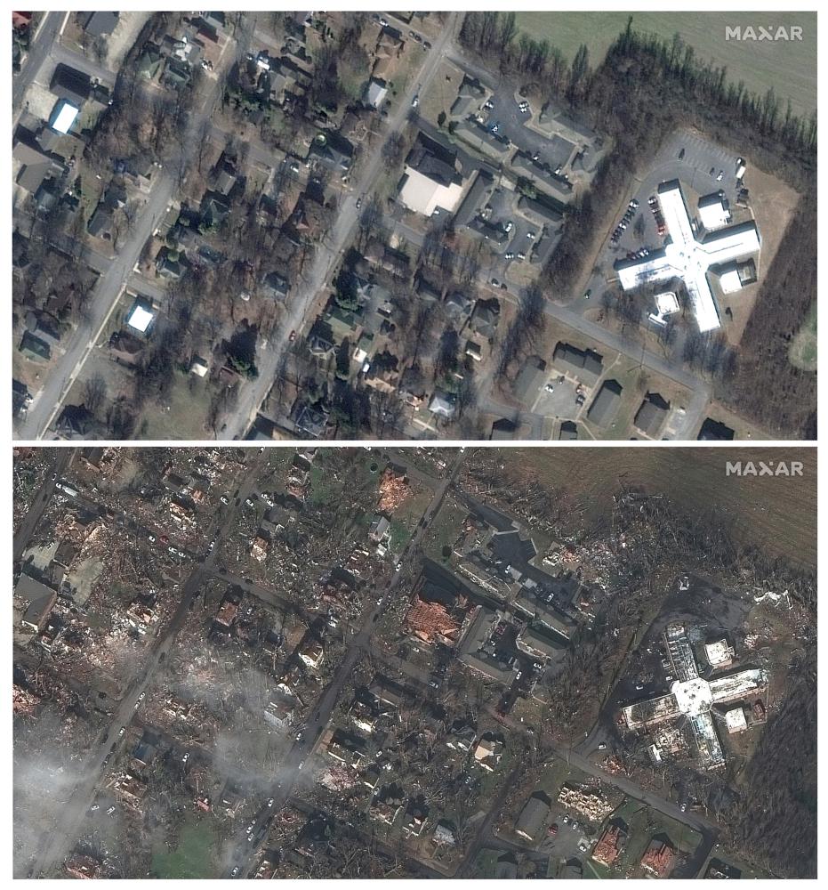 This combination of satellite images provided by Maxar Technologies shows homes and buildings in Mayfield, Ky., on Jan. 28, 2017, top, and below on Saturday, Dec. 11, 2021, after a tornado caused heavy damage in the area. (Satellite image ©2021 Maxar Technologies via AP)