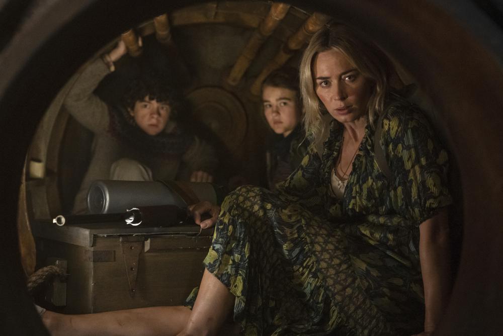 This image released by Paramount Pictures shows, from left, Noah Jupe, Millicent Simmonds and Emily Blunt in a scene from 