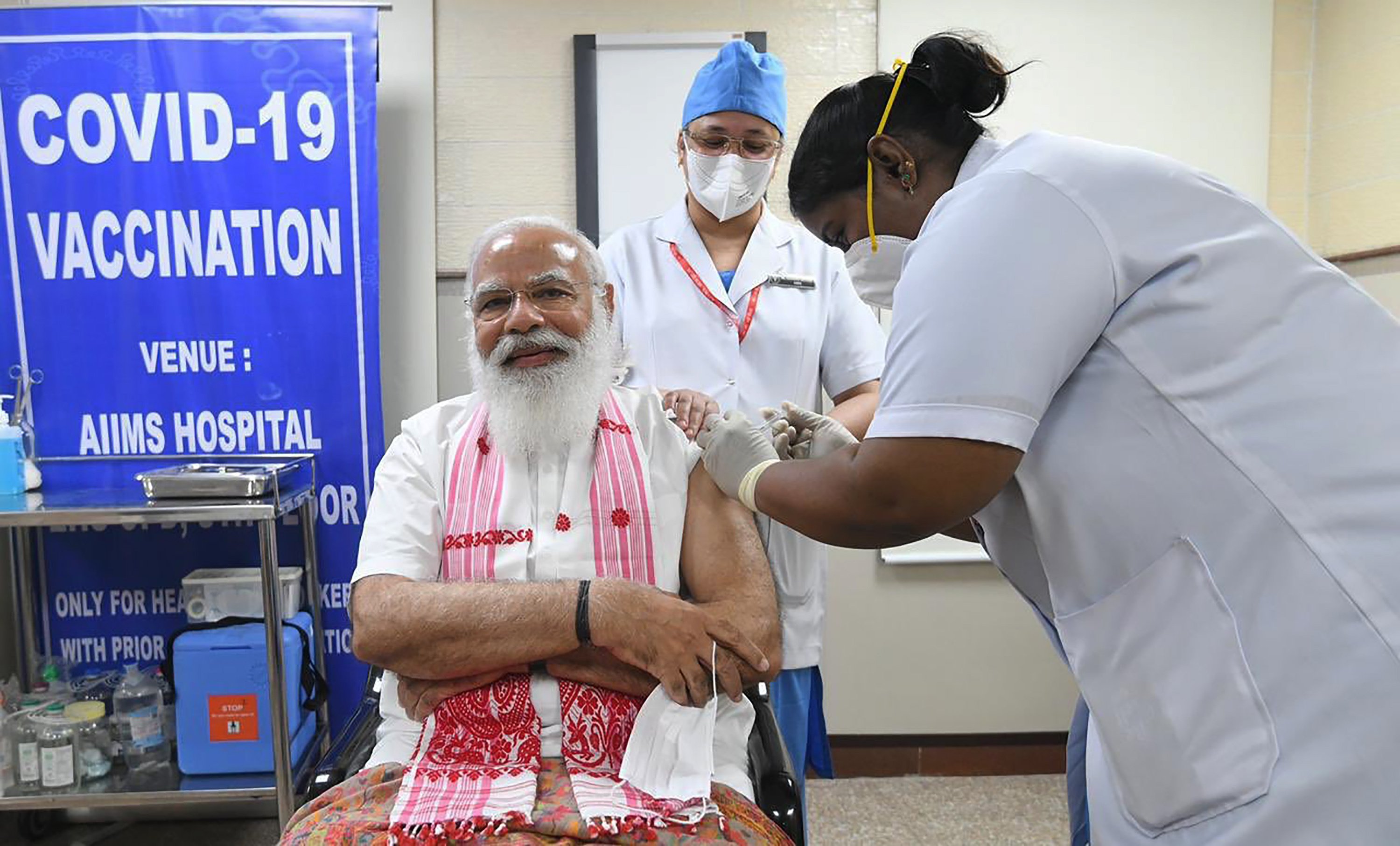 India provides COVID-19 vaccines to more people as cases increase