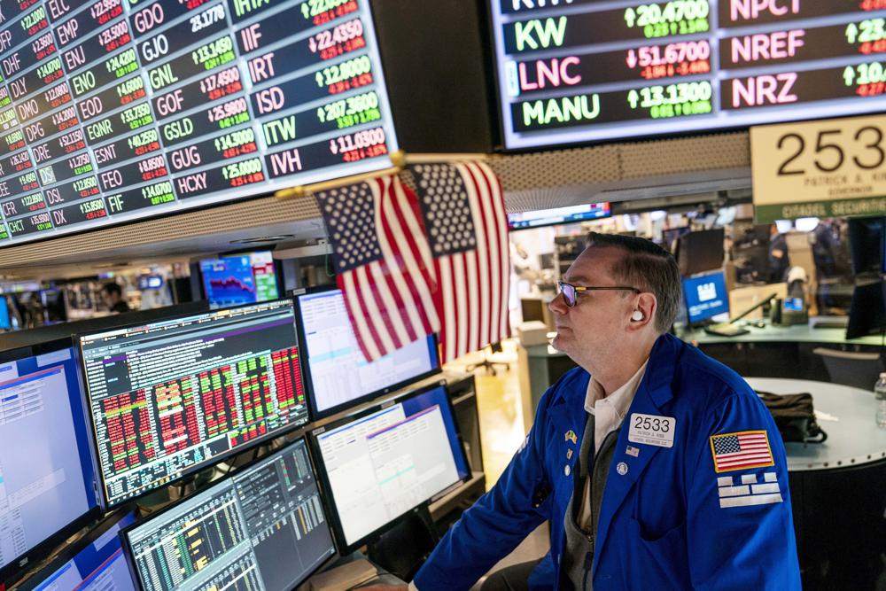 FILE - Trader Patrick King works the floor at the New York Stock Exchange, Thursday, May 12, 2022, in New York. Stocks fell sharply on Wednesday as the Stocks fell sharply on Wednesday as the Dow Jones Industrial Average gave up more than 1,100 points, or 3.6% and the tech-heavy Nasaq pulled back 4.7%. The S&P 500, the benchmark for many index funds, fell 4%. (AP Photo/John Minchillo, File)