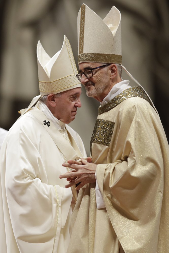 FILE - In this Oct. 4, 2019 file photo Pope Francis ordains bishop Michael Czerny, as he celebrates a mass during which he conferred the ordination to four bishops in St. Peter's Basilica at the Vatican. Bishop Czerny is among 13 men Pope Francis admires, resembles and has chosen to honor as the 13 newest cardinals who will be elevated at a formal ceremony Saturday, Oct. 5, 2019. (AP Photo/Alessandra Tarantino, file)