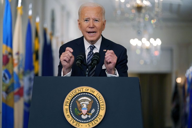 Biden aims for quicker shots, honors ‘collective suffering’ of Americans