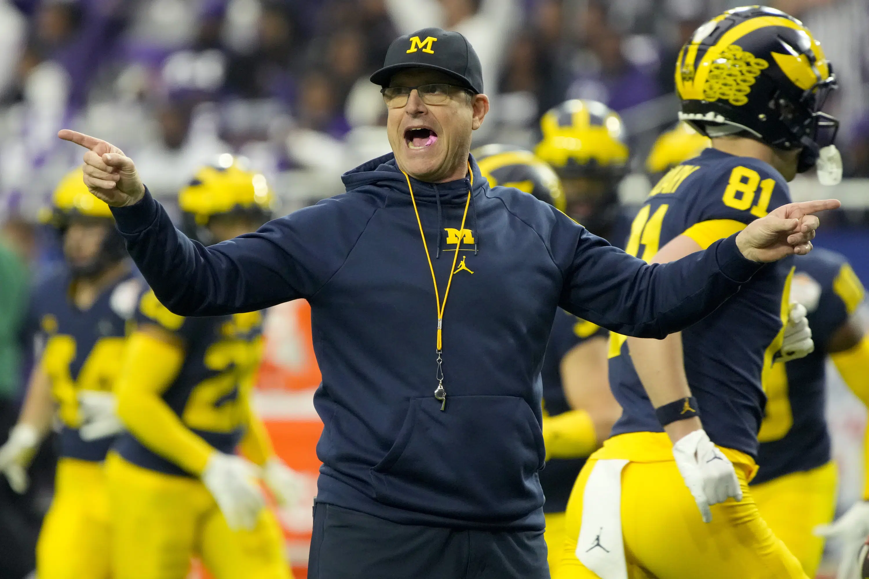 AP source: Michigan's Harbaugh refuses to agree on charge | AP News