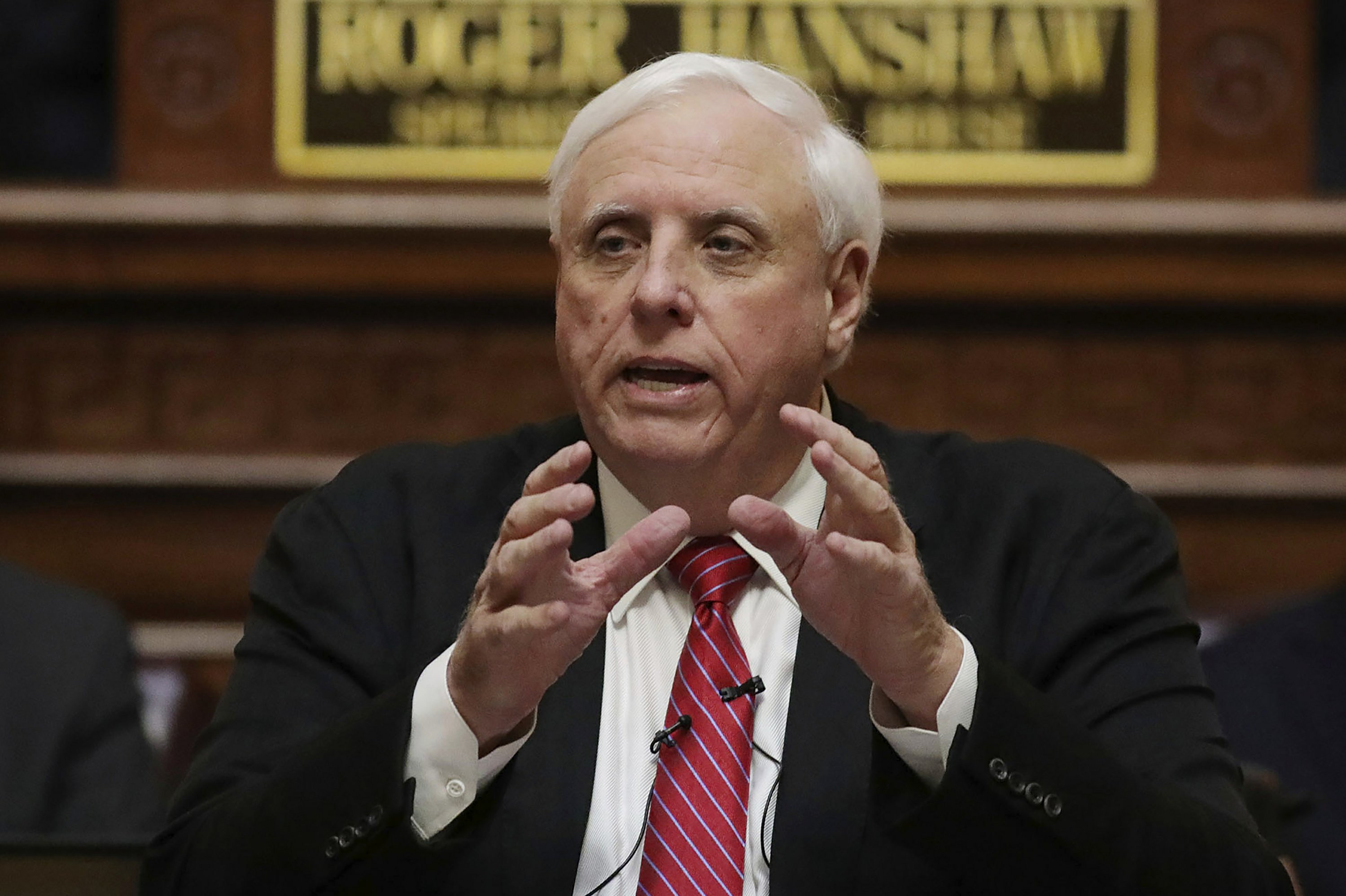 West Virginia governor mandates masks as cases rise AP News