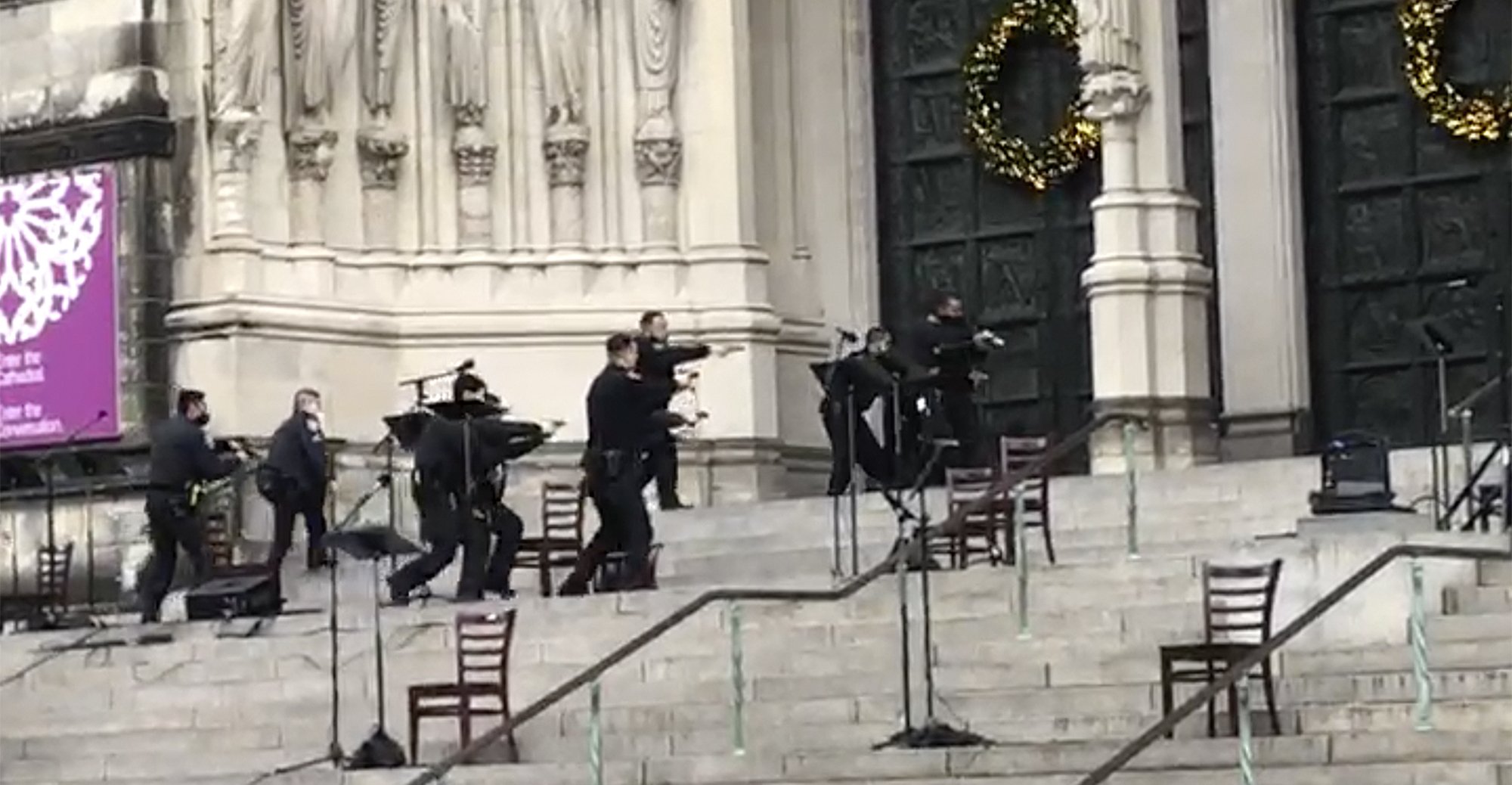 Gunman was shot by police at a NYC cathedral Christmas concert