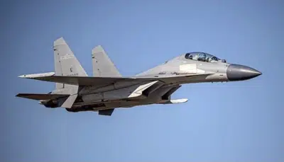 FILE - In this undated file photo released by the Taiwan Ministry of Defense, a Chinese PLA J-16 fighter jet flies in an undisclosed location. China’s military sent 71 planes, including J16 fighter jets, and seven ships toward Taiwan in a 24-hour display of force directed at the island, Taiwan’s defense ministry said Monday, Dec. 26, 2022, after China expressed anger at Taiwan-related provisions in a U.S. annual defense spending bill passed on Saturday.(Taiwan Ministry of Defense via AP, File)