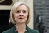 FILE - Outgoing British Prime Minister Liz Truss speaks outside Downing Street in London, on Oct. 25, 2022. Writing in the Sunday Telegraph newspaper on Sunday, Feb. 5, 2023, Truss says it wasn’t her fault. Truss alleges that a “powerful economic establishment” and opponents inside the governing Conservative Party thwarted her plans for a tax-cutting overhaul of the U.K. economy. (AP Photo/Frank Augstein, File)