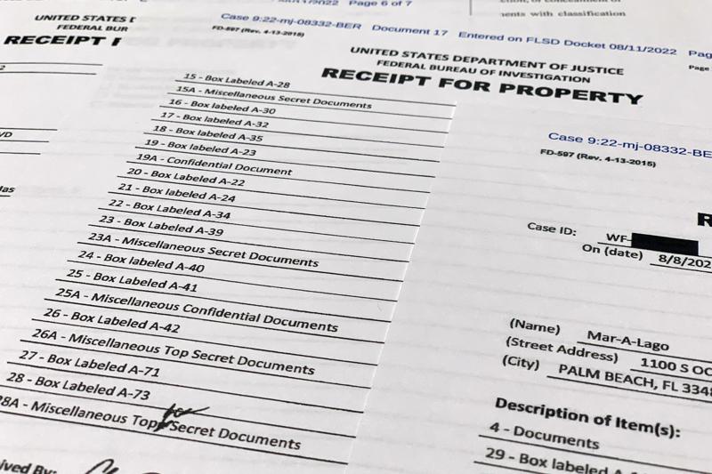 The receipt for property that was seized during the execution of a search warrant by the FBI at former President Donald Trump's Mar-a-Lago estate in Palm Beach, Fla., is photographed Friday, Aug. 12, 2022. (AP Photo/Jon Elswick)