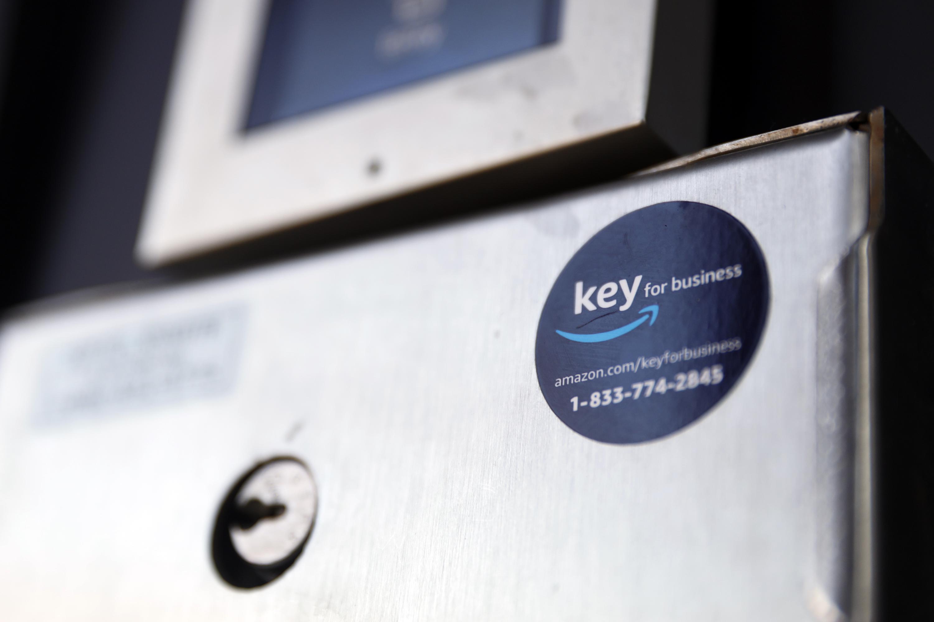 A look at Amazon's Key For Business program, launched in 2018 to let drivers unlock apartment buildings via an app, which it is encouraging landlords to adopt (Joseph Pisani/Associated Press)